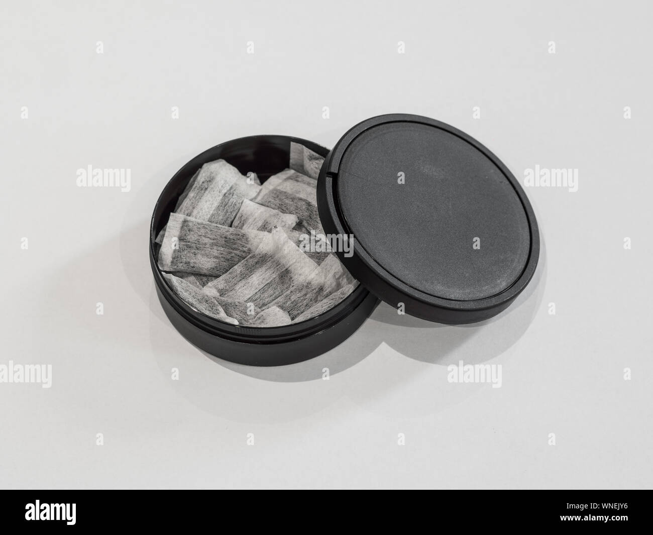 Swedish snus on white background with black box Stock Photo