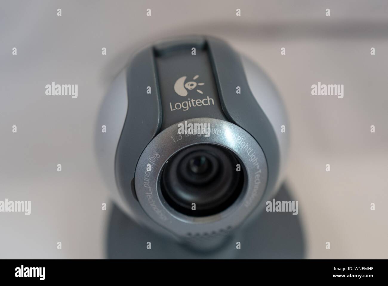 Close-up of Logitech consumer computer webcam, ca 2004, in gray color with  lens visible on white background, August 29, 2019 Stock Photo - Alamy