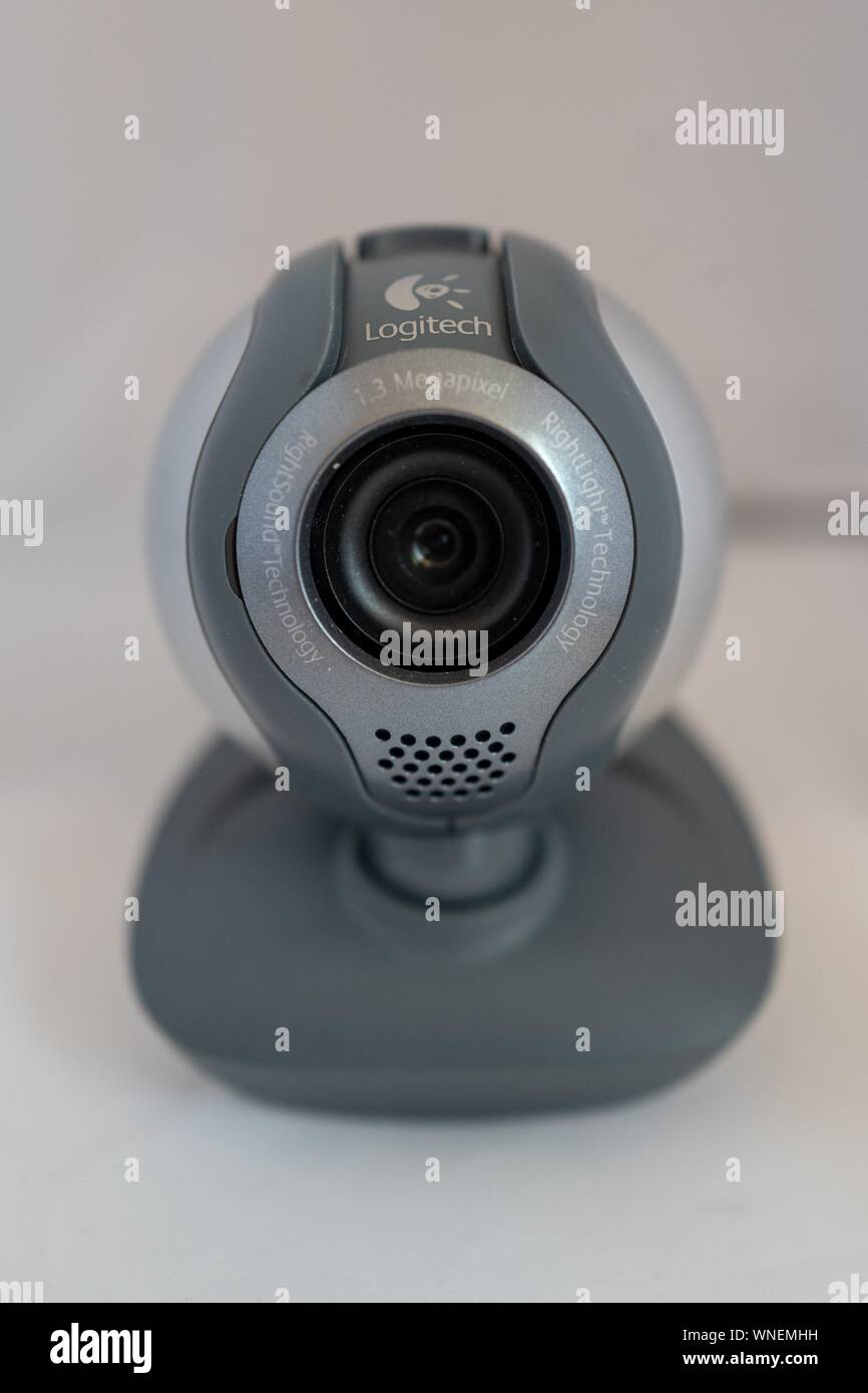 Close-up of Logitech consumer computer webcam, ca 2004, in gray color with  lens visible on white background, August 29, 2019 Stock Photo - Alamy