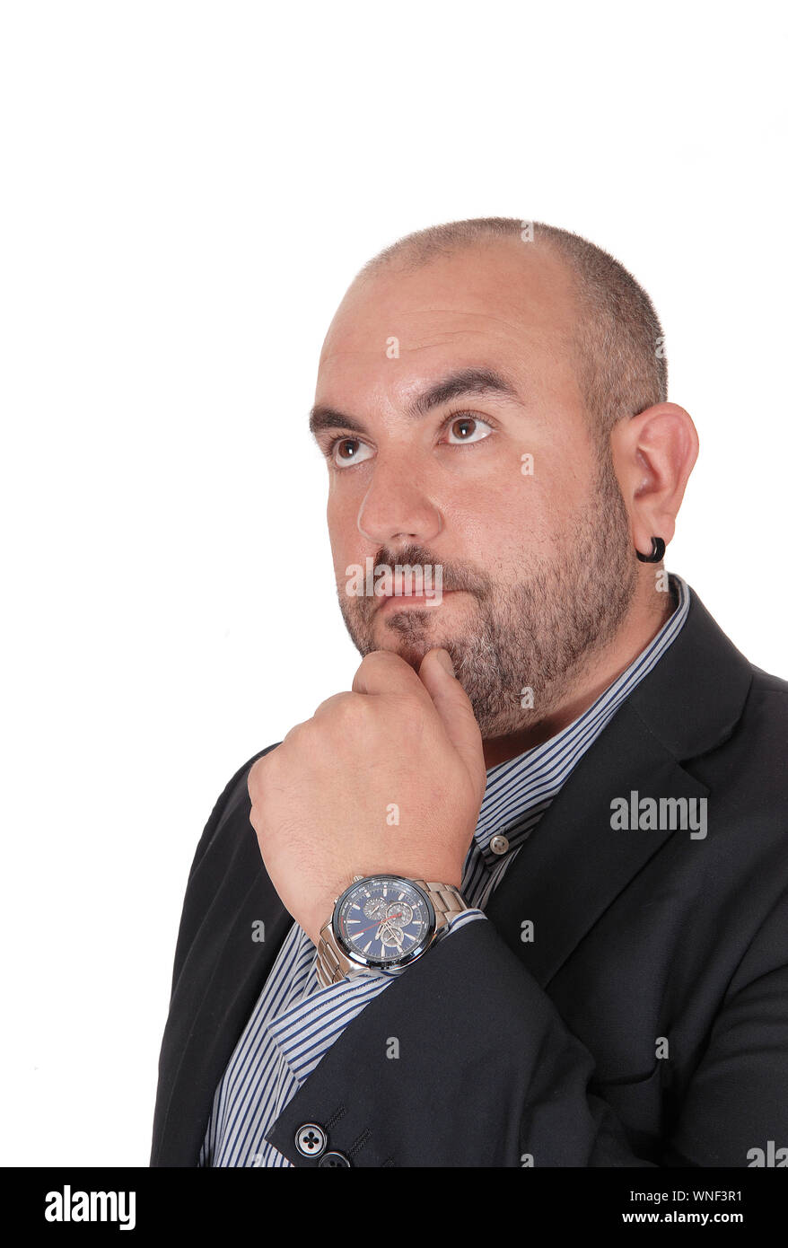 A close up image of an Hispanic middle age man with his hand on his chin and thinking hand, looking up, isolated for white background Stock Photo