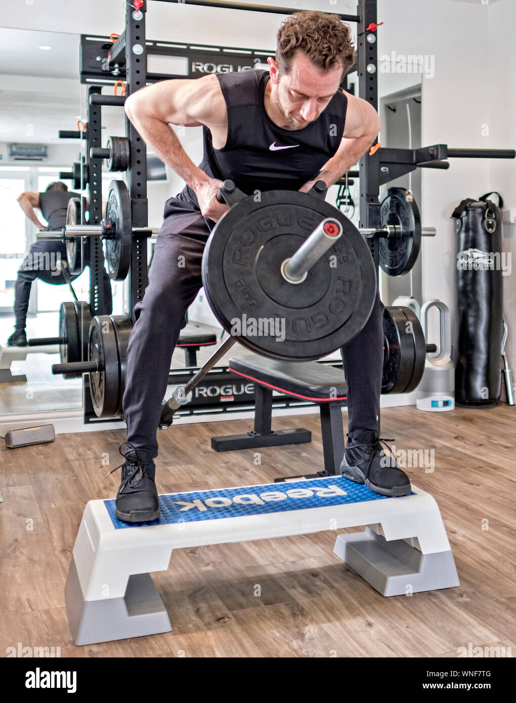Fitness studio and gym with equipment Stock Photo Alamy