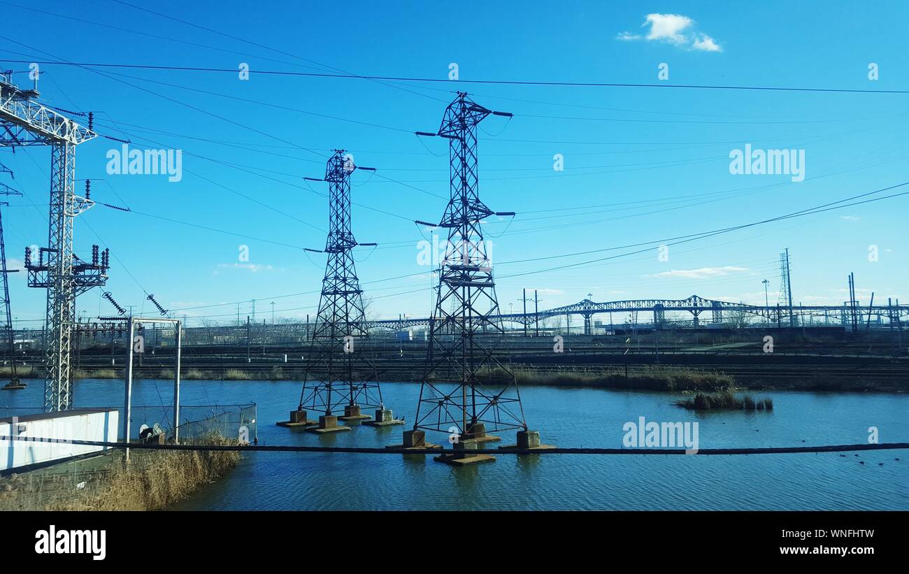 Electricity pylons in water hires stock photography and images Alamy
