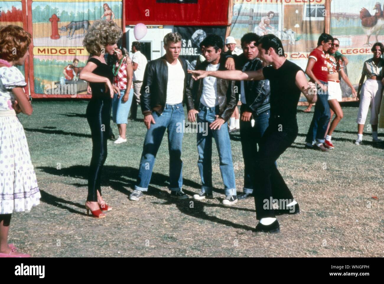 Grease  Year: 1978 USA Olivia Newton John, Kelly Ward, Barry Pearl, Michael Tucci, John Travolta  Director: Randal Kleiser Stock Photo