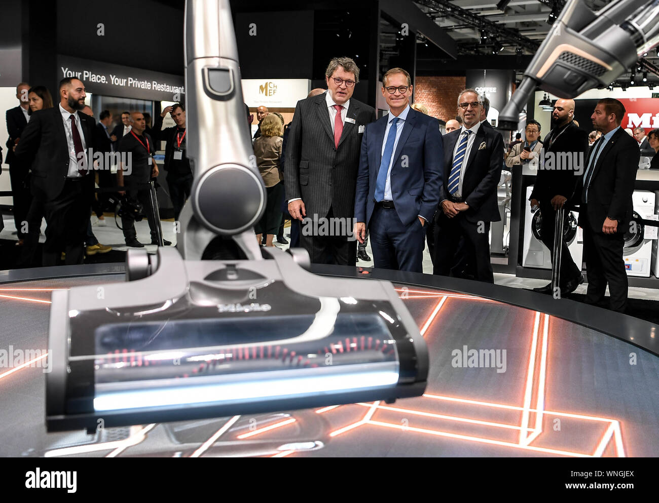 Berlin, Germany. 06th Sep, 2019. Reinhard Christian Zinkann, Managing Partner of Miele (l-r), Michael Müller (SPD), Berlin's Governing Mayor, and Hans-Joachim Kamp, Chairman of gfu's Supervisory Board, will take a look at Miele's stand at the IFA technology trade fair, the world's largest trade fair for consumer electronics. The IFA takes place from 06.-11.09.2019 at the Berlin Exhibition Grounds. Trade visitors from more than 100 countries visit presentations of the latest products and innovations Credit: Britta Pedersen/dpa-Zentralbild/dpa/Alamy Live News Stock Photo