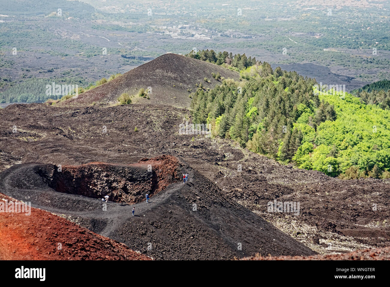 Mount Etna; Europe's largest active volcano; nature, destruction, devastation, vegetation, people, Catania; Sicily; Italy; summer; horizontal Stock Photo