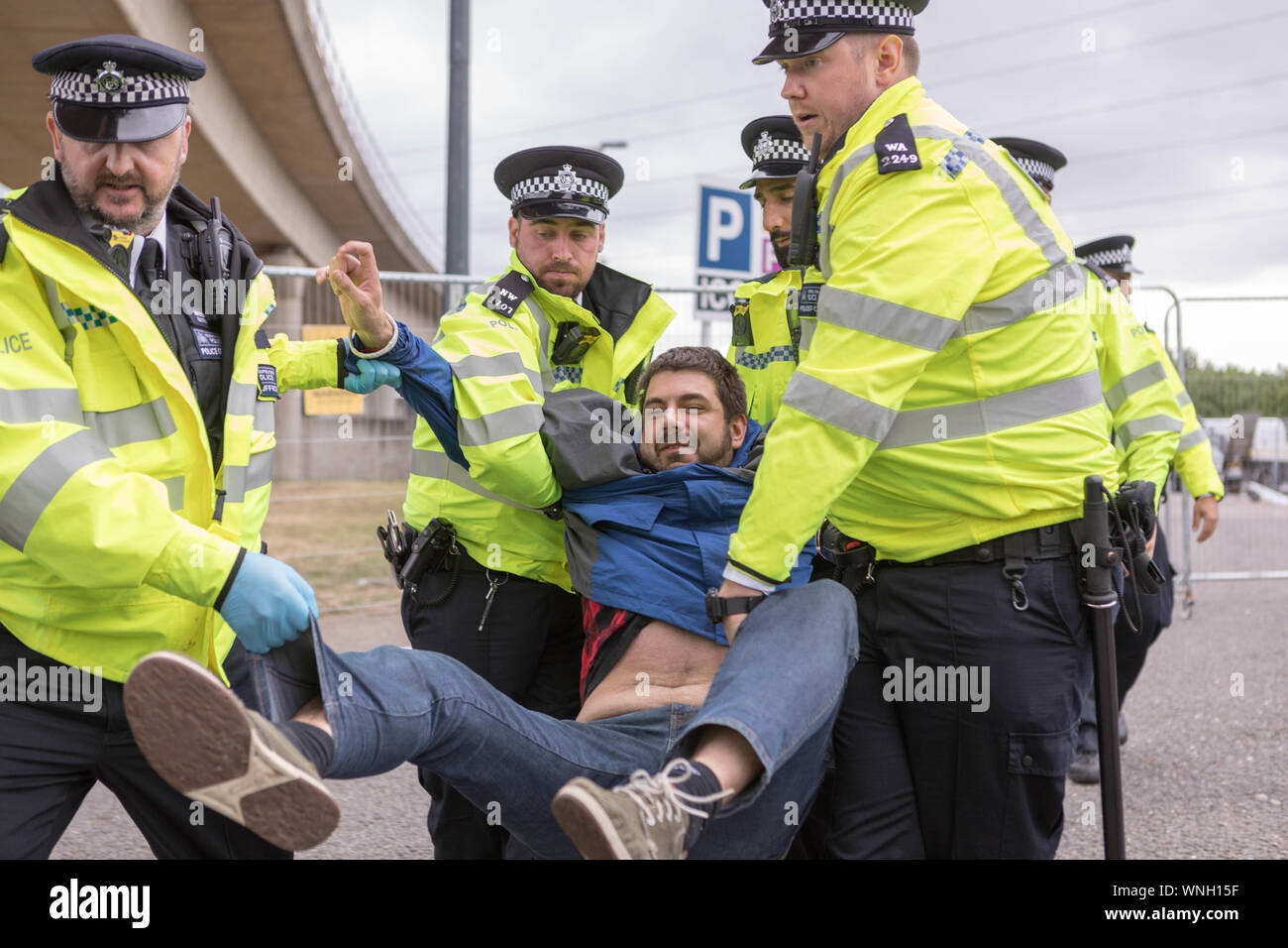 Excel Centre, London, UK. 6th Sept 2019. Four protesters are locked ...