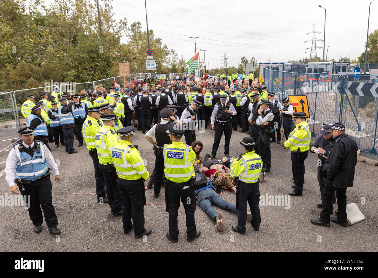 Excel Centre, London, UK. 6th Sept 2019. Four protesters are locked ...