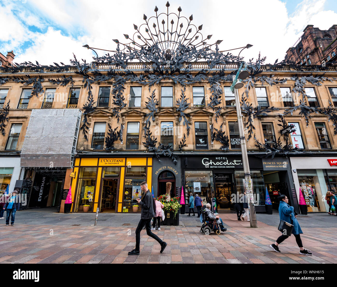 People walking past Princes Square shopping mall entrance, Buchanan Street, Glasgow, Scotland, UK Stock Photo