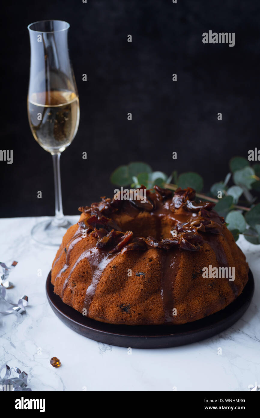 Festive bundt cake with dates and salted caramel. Sticky toffee pudding