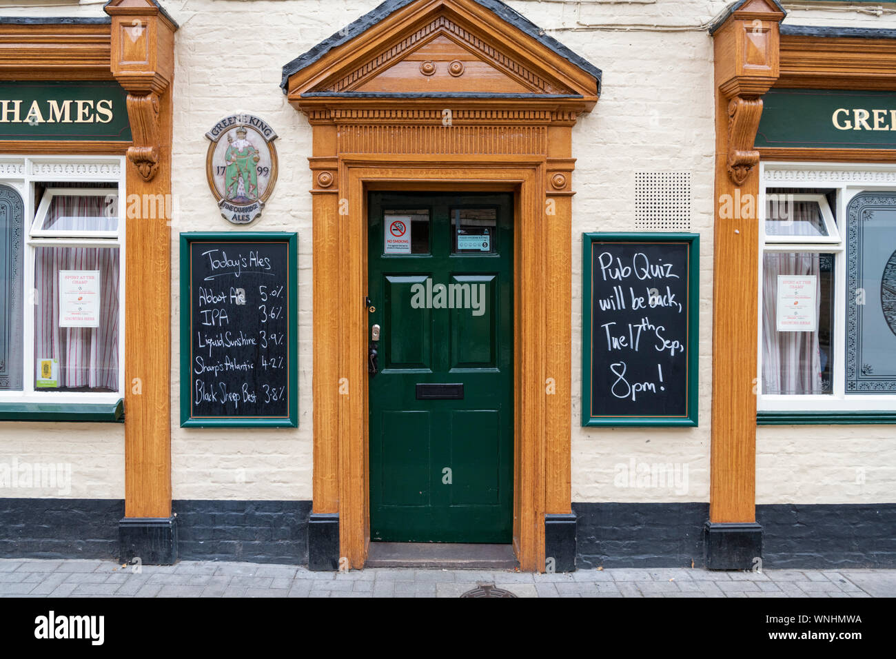 The front of the Champion of the Thames pub in Cambridge UK  with blackboards advertising the beers and ales and a pub quiz. Stock Photo