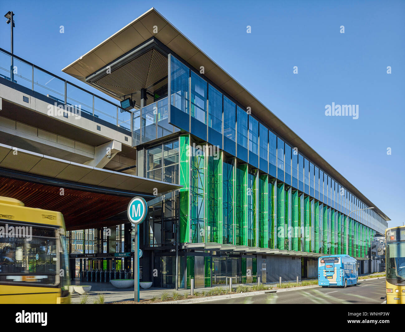 Station building and elevated train line. North West Metro Stations, Sydney, Australia. Architect: HASSELL, 2019. Stock Photo