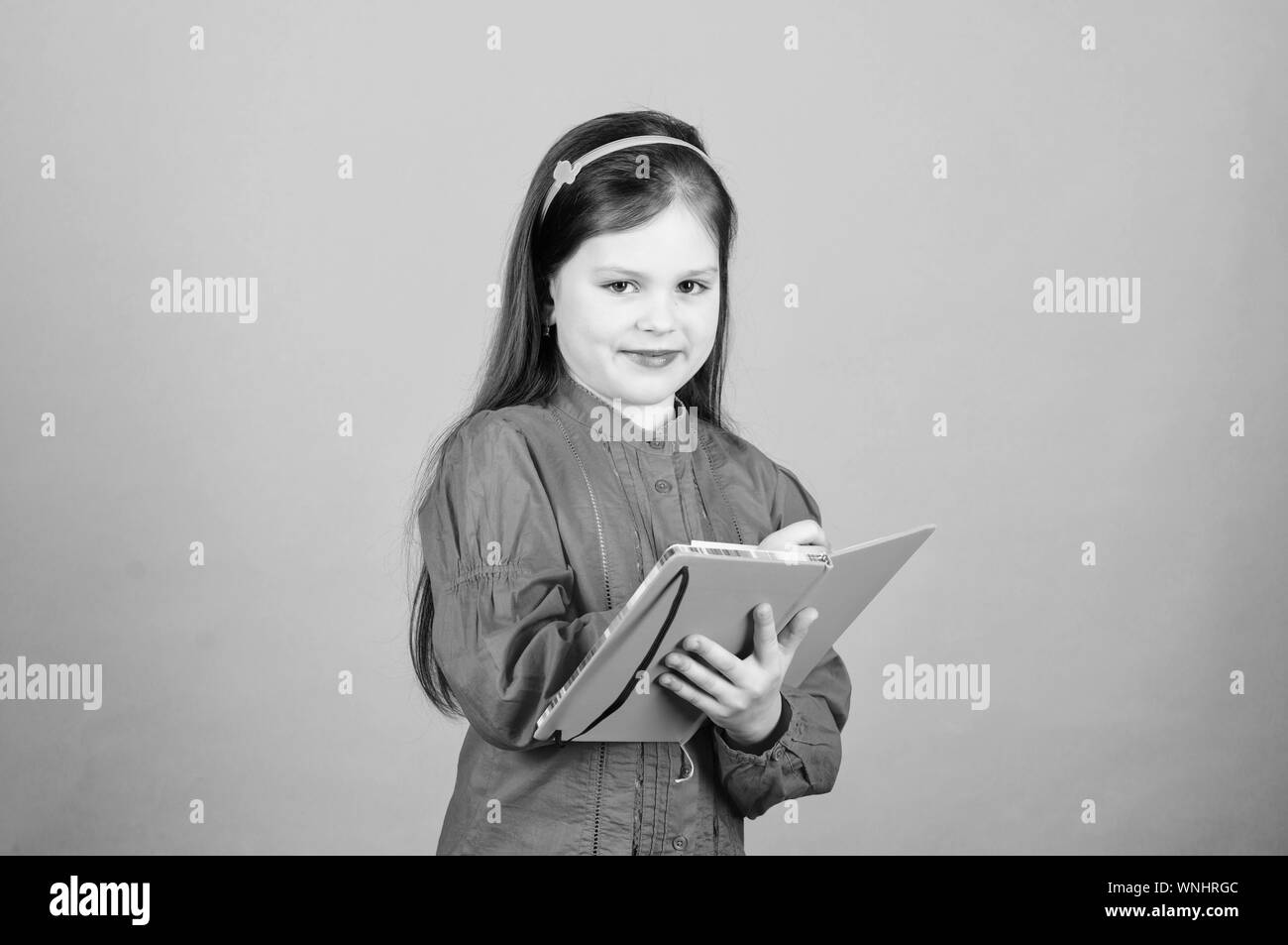 Lets look in the book of scientific knowledge. Cute little child