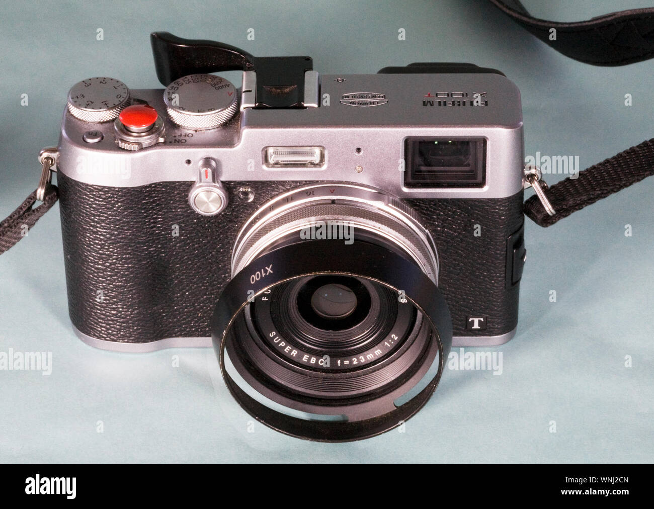 Detail of a Japanese made, DSLR camera, made by Fuji, with a fixed focus lens. Stock Photo