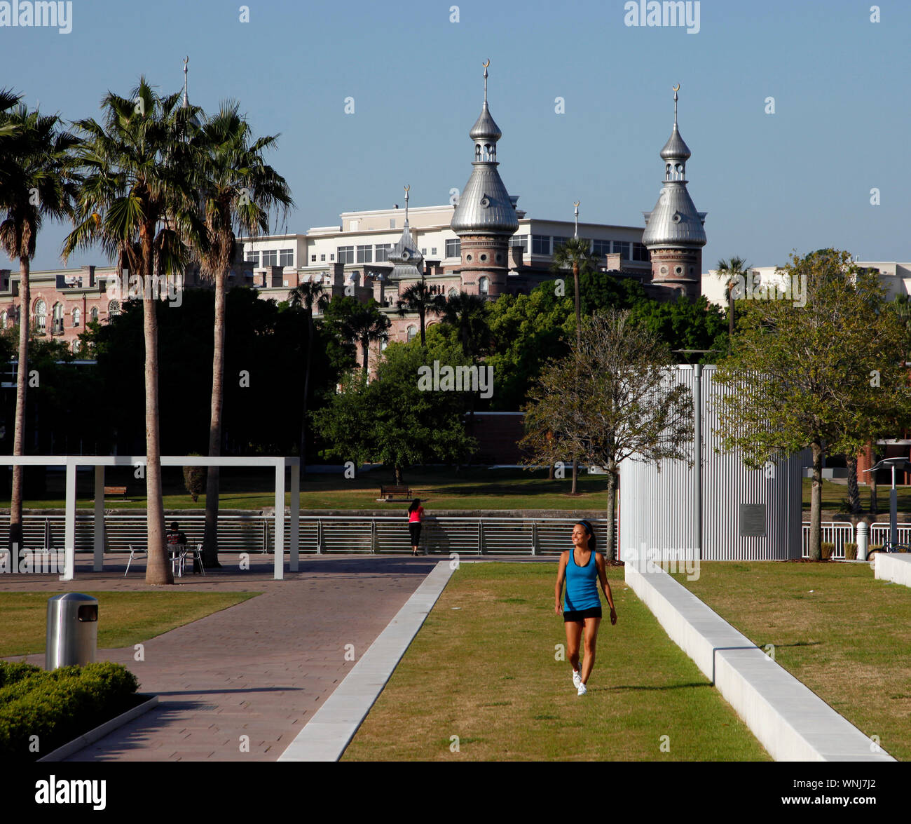 A woman on a morning walk in Curtis Hixon Park in Downtown Tampa, Florida. Stock Photo