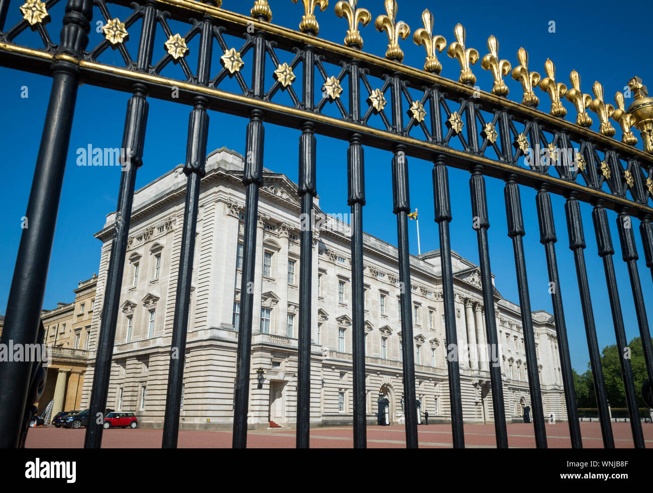 LONDON MAY 14, 2018 A tall black and gold fence surrounds Buckingham
