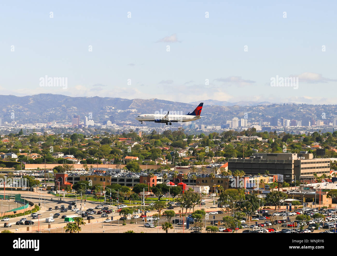 Los Angeles, California, USA - May 22, 2019: A plane from Delta Airlines lands on the Los Angeles International Airport (LAX). Stock Photo