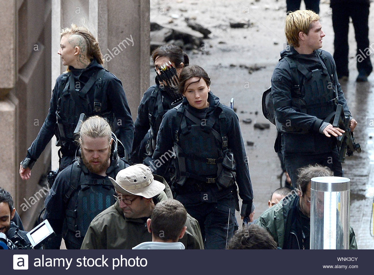 Noisy Le Grand France Jennifer Lawrence Josh Hutcherson Liam Hemsworth Sam Claflin Natalie Dormer And Evan Ross Get Geared Up In Uniform As They Films Scenes For Their Upcoming Movie The Hunger Games