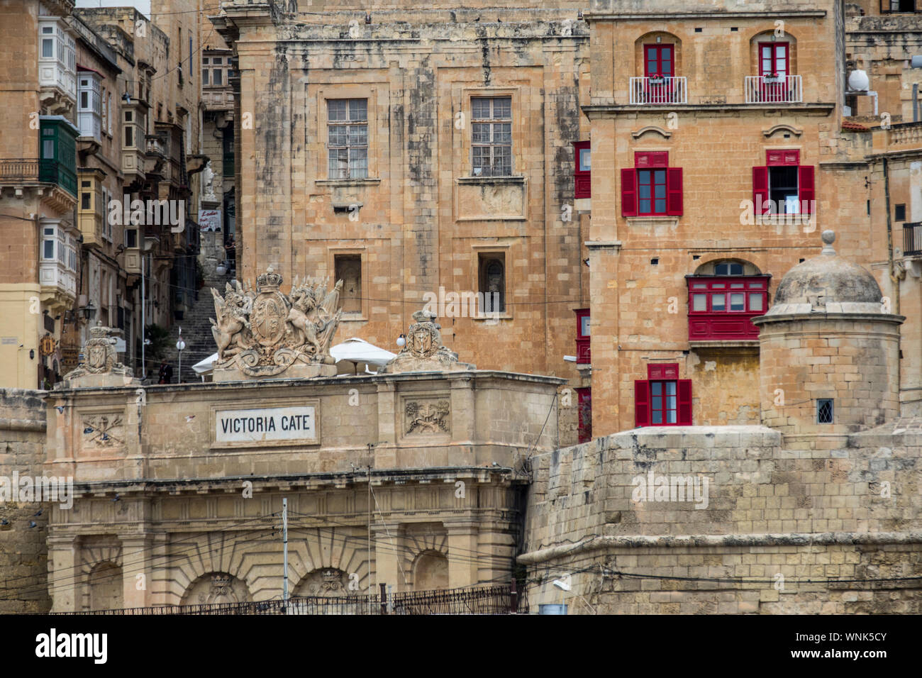 Old town facade of Valetta, Malta, towards Grand Harbour, Victoria Gate, Stock Photo