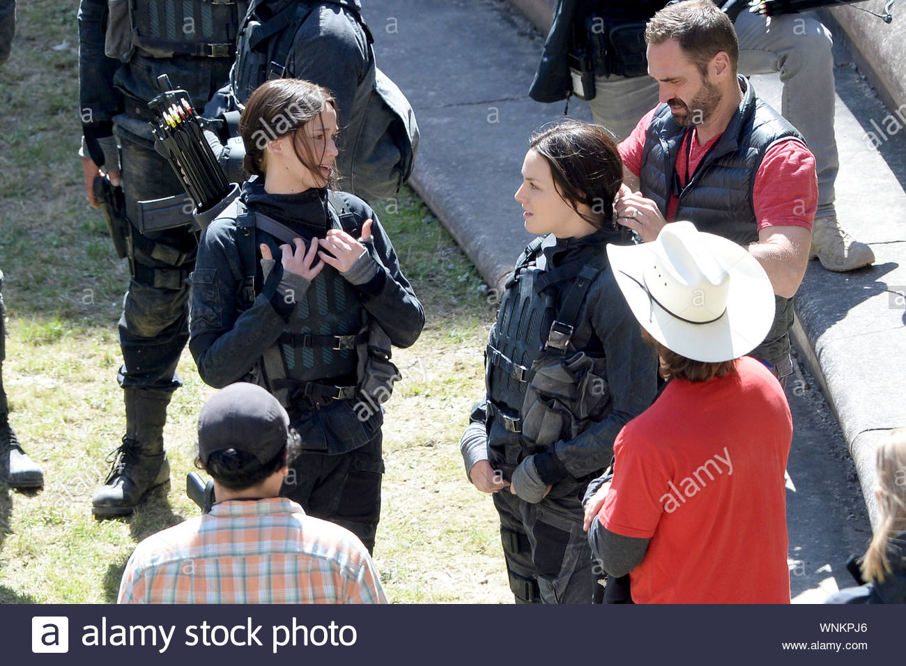 Noisy Le Grand France Jennifer Lawrence Makes Sure To Lighten The Mood In Between Takes On The Set Of The Hunger Games Mockingjay As She And Her Costars Liam Hemsworth And Josh Hutcherson
