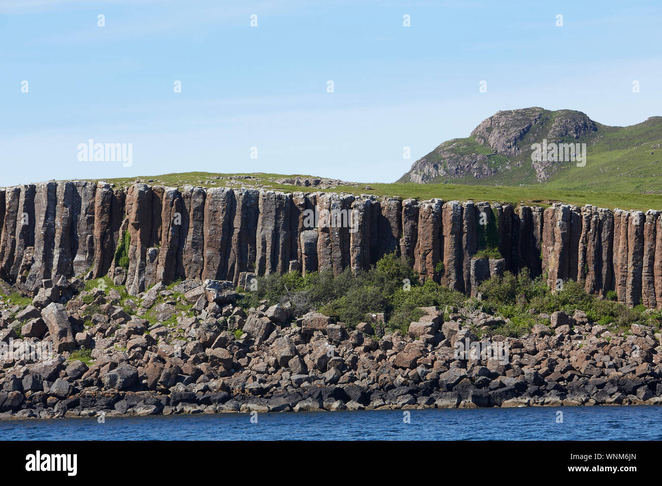 Basalt rock columns seen from Loch Na Keal on the Isle of Mull, Inner Hebrides, Scotland, UK Stock Photo