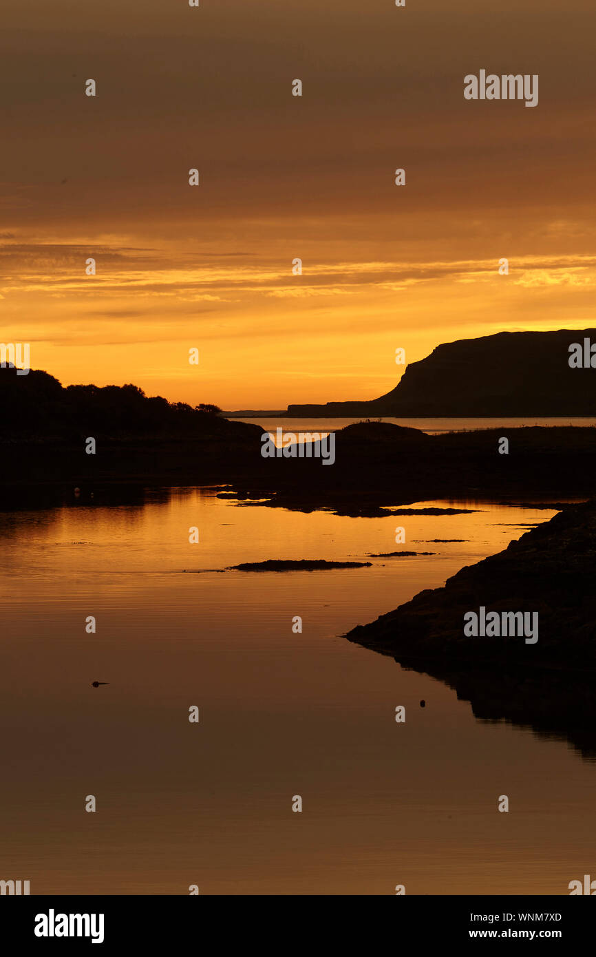 Sunset over Loch Tauth Laggan Bay, Ulva, Isle of Mull, Scotland, UK. Stock Photo