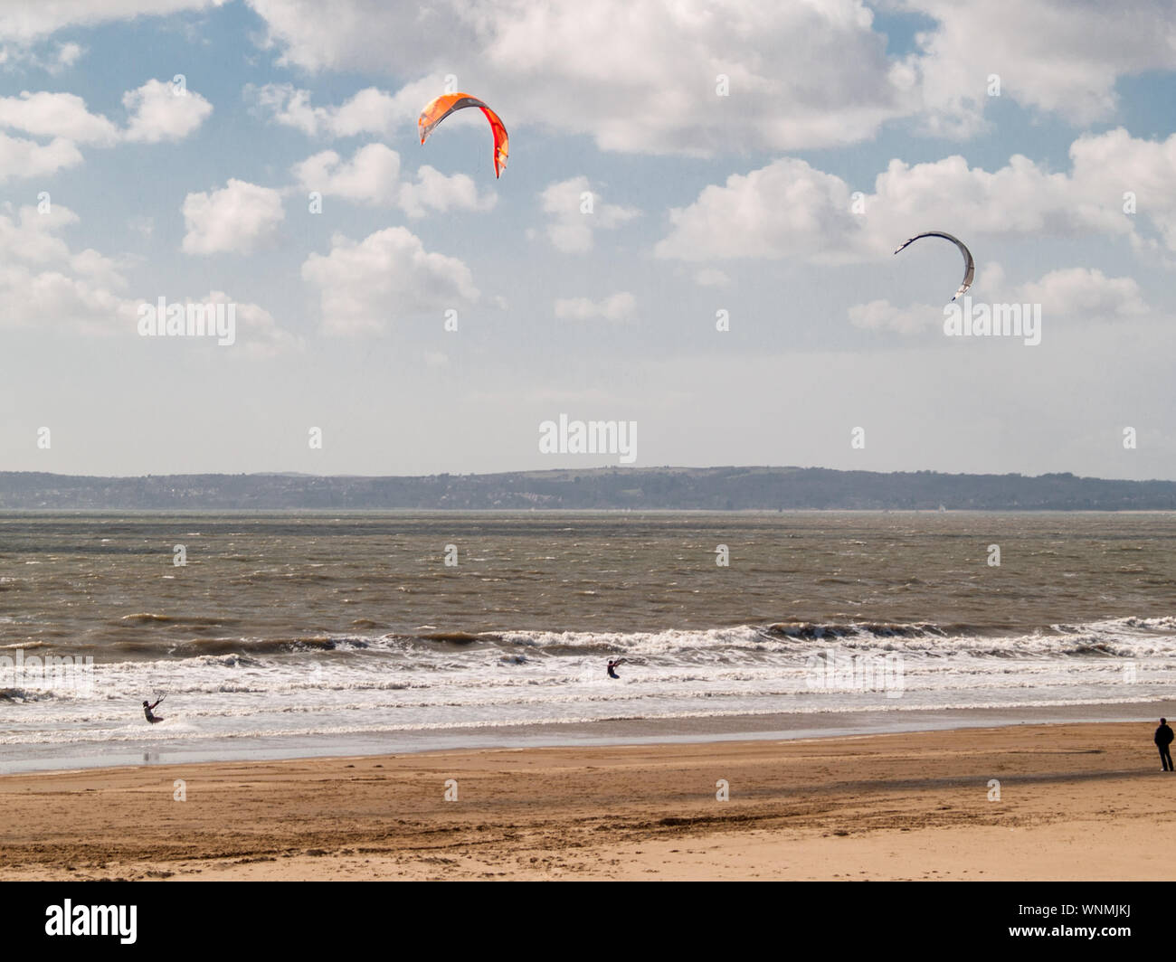 Kitesurfing at Aberavon Beach, Port Talbot, Swansea bay, Wales, UK. Stock Photo