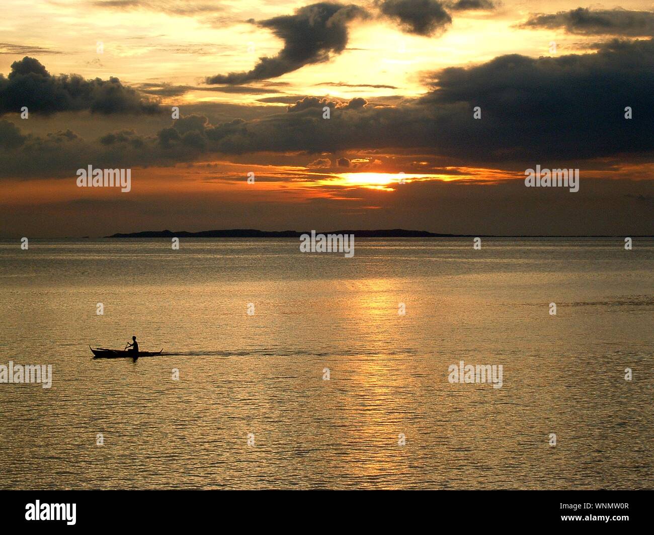Man riding boat on body hi-res stock photography and images - Alamy