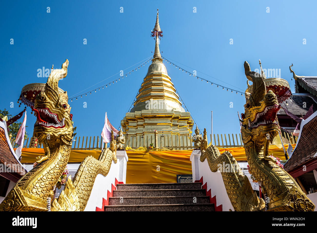 Chiangmai, Thailand - February 24, 2019: View of the golden pagoda at Wat Phra That Doi Kham temple in Chiangmai, Thailand. Stock Photo