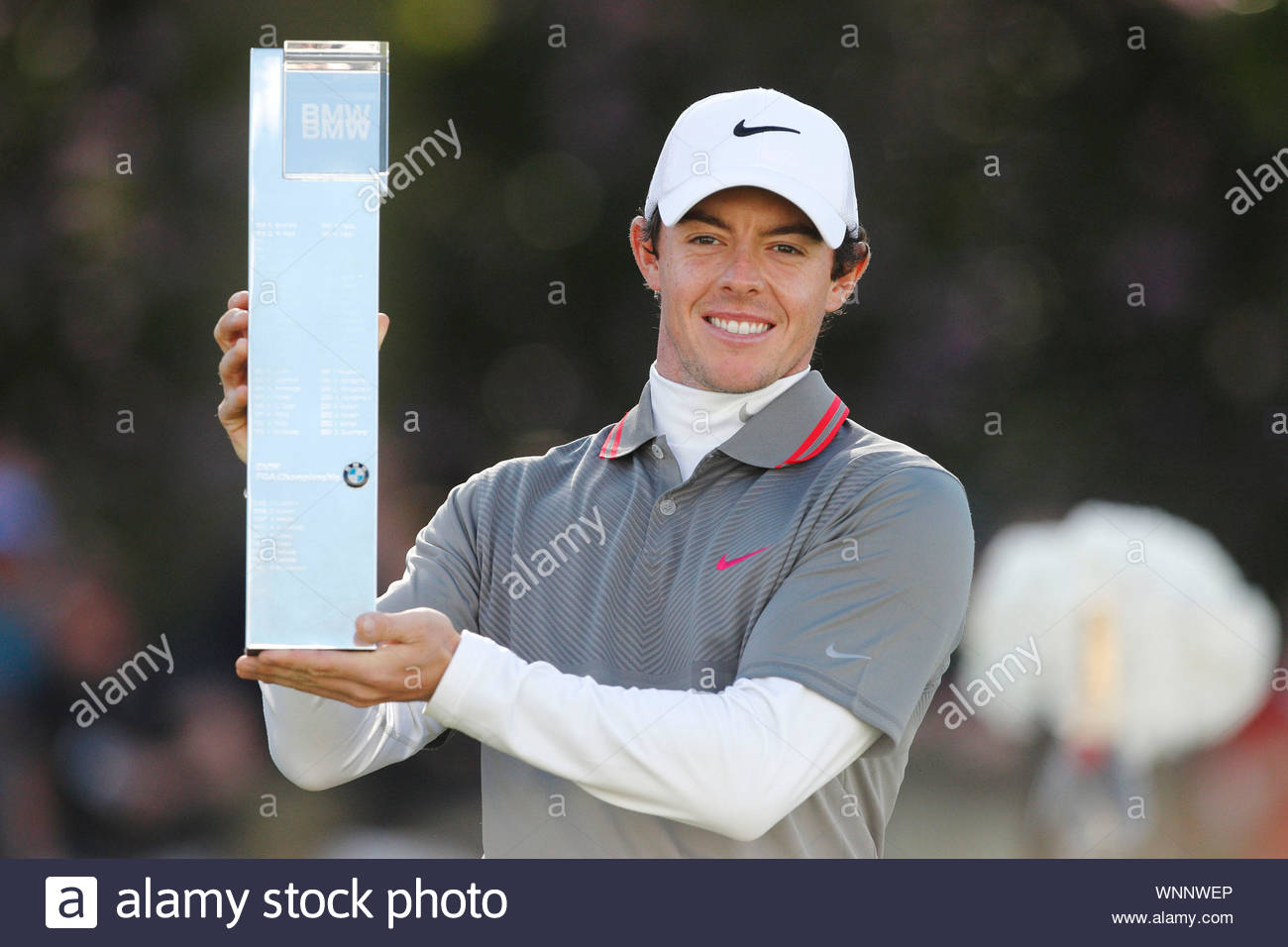 Surrey Uk Rory Mcilroy Poses With His Trophy After His Win At The 2014 European Tour