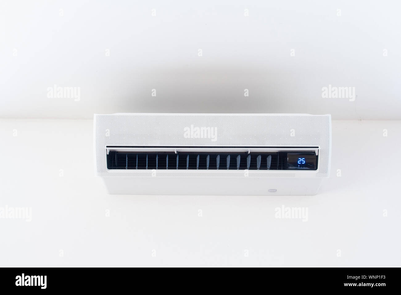 Air conditioner on wall background Stock Photo