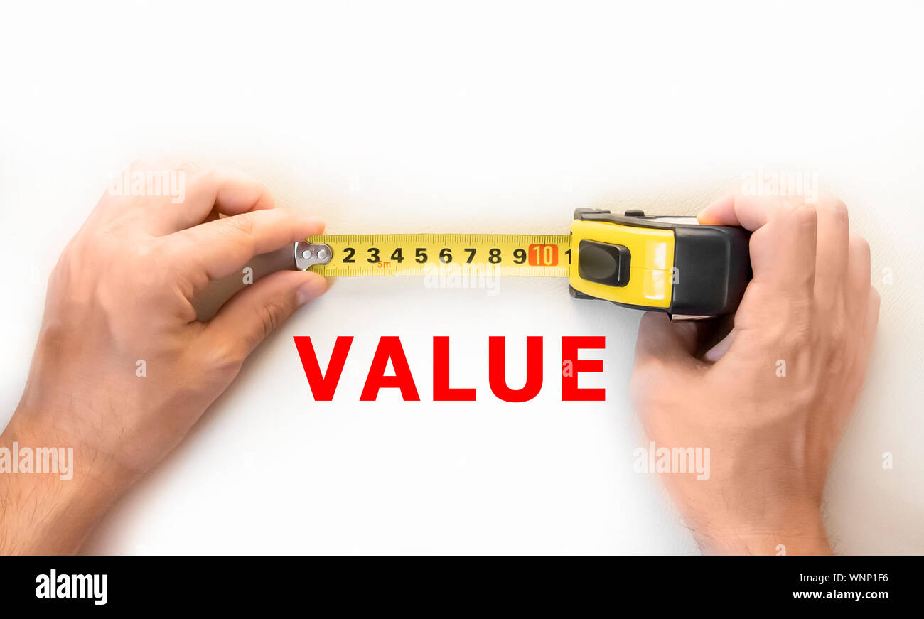 hands holding measure tape measuring value Stock Photo