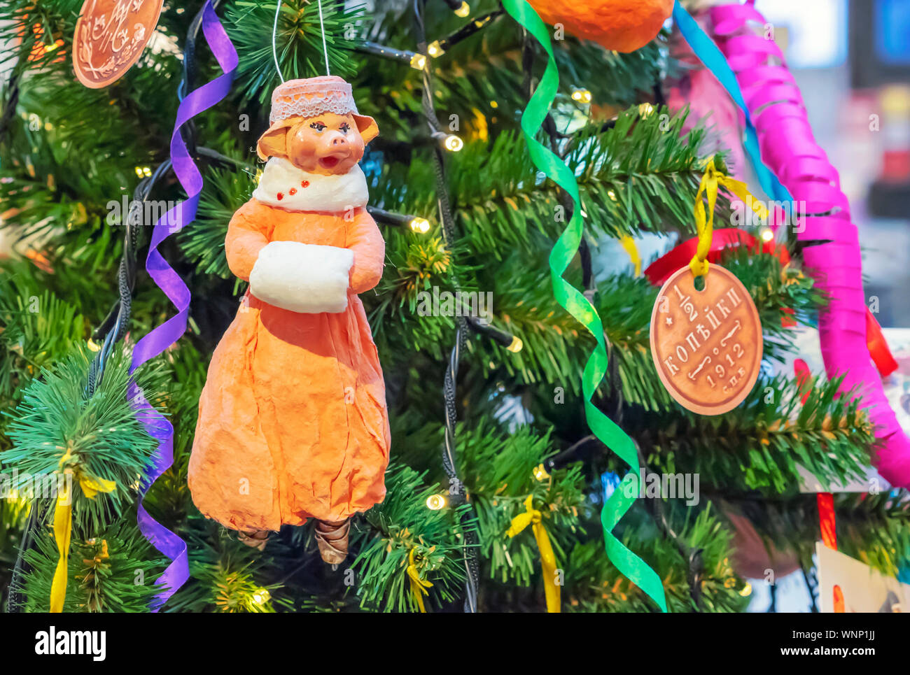Vintage glass toy pig on the Christmas tree Stock Photo - Alamy