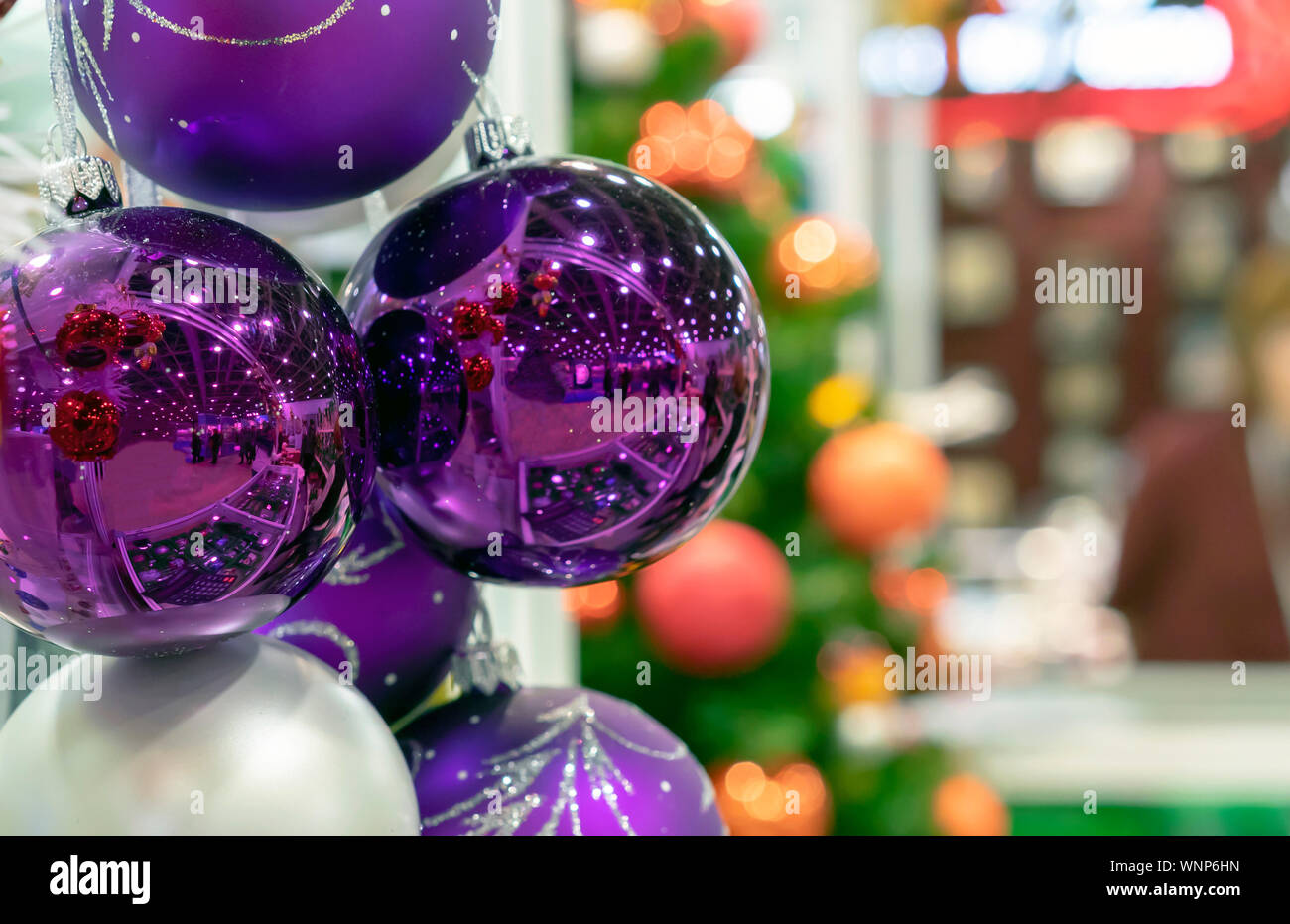 Violet Christmas balls on the background of the Christmas tree Stock ...