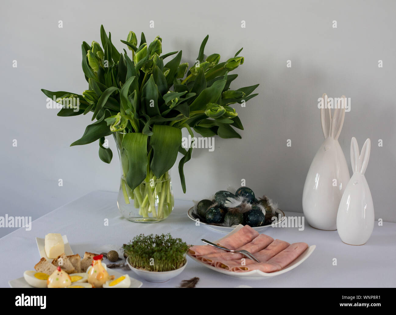 Traditional, polish Easter table with colored eggs, boiled eggs Stock Photo