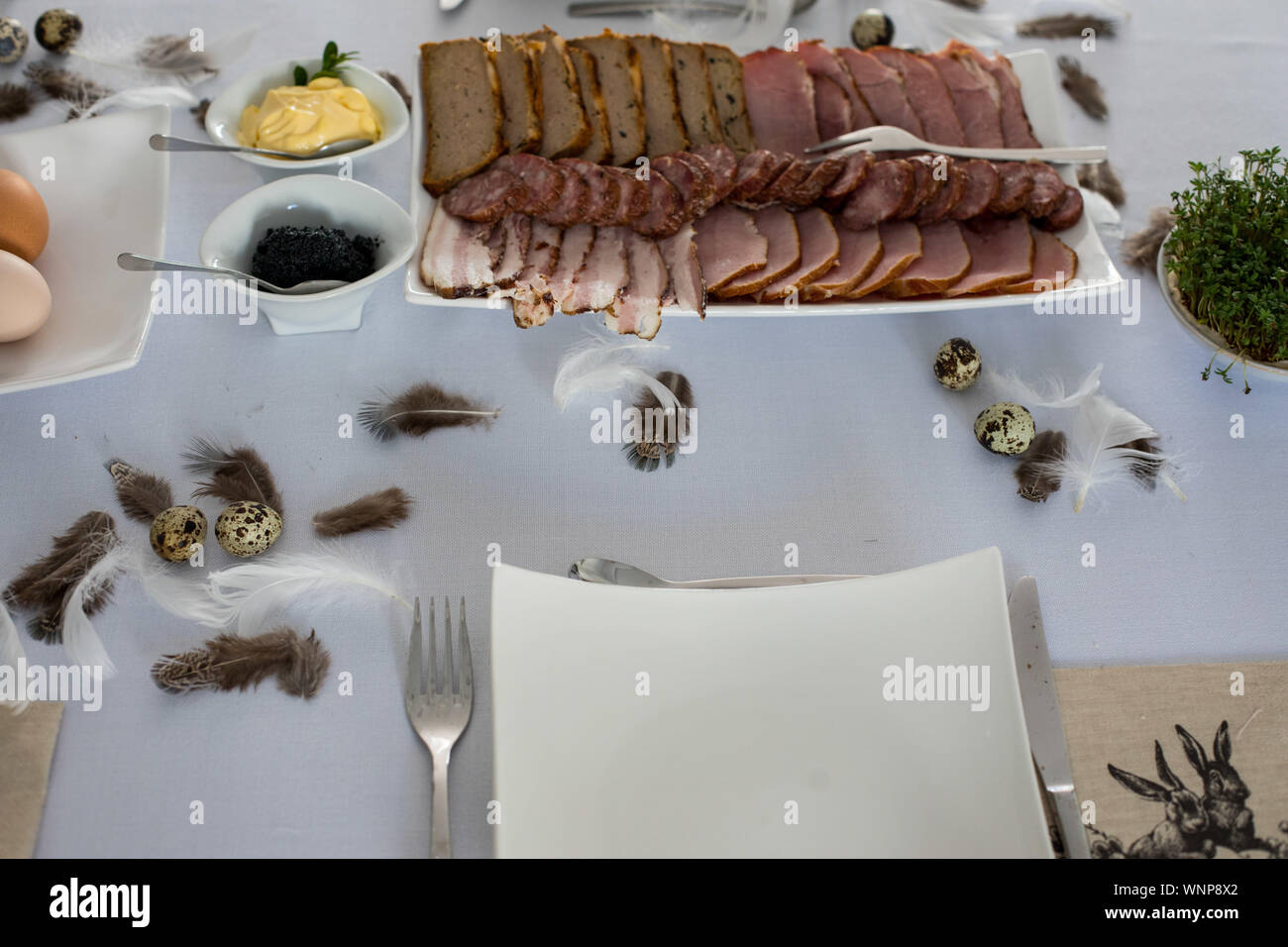 Traditional, polish Easter table with colored eggs, boiled eggs Stock Photo