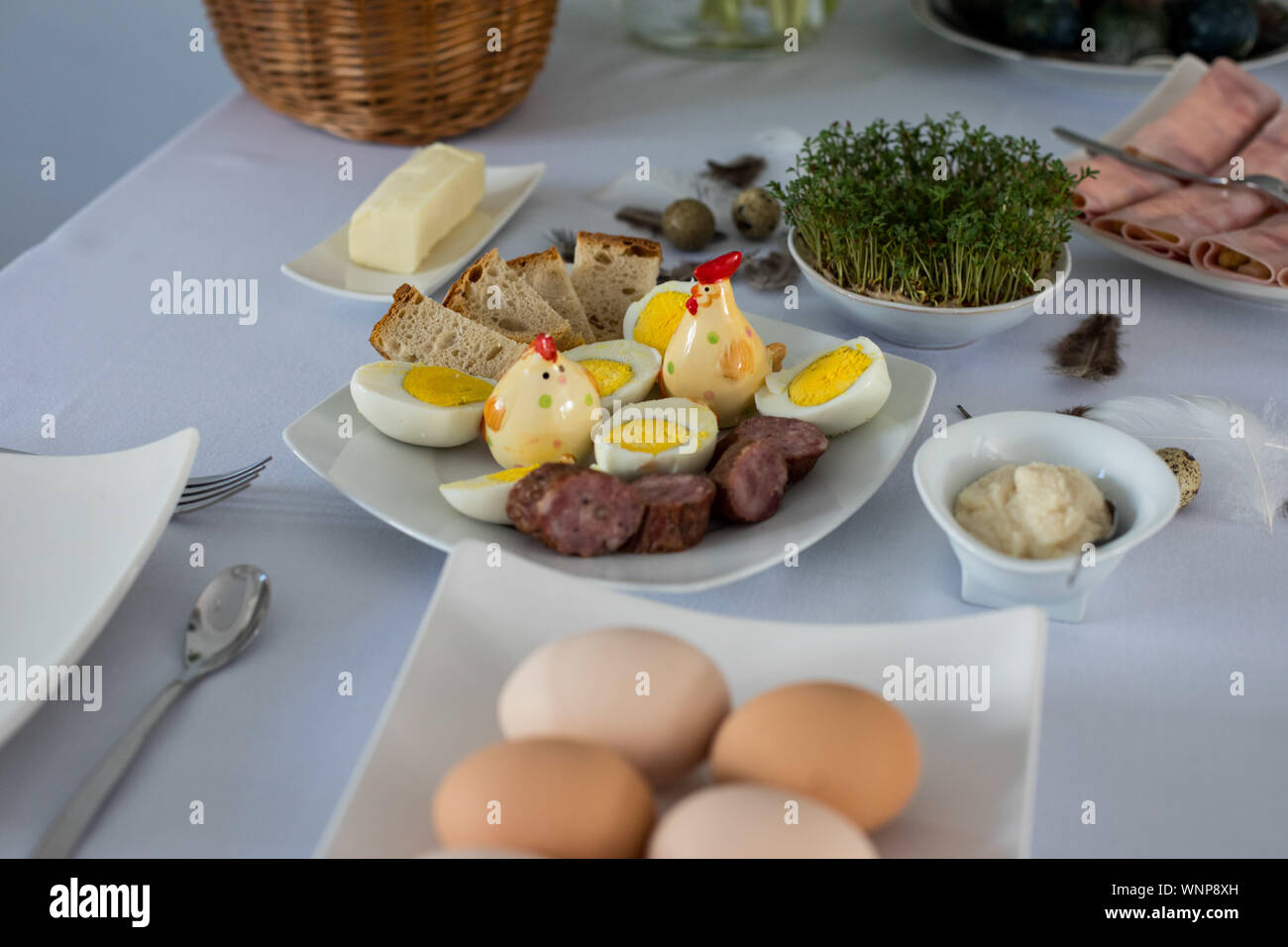 Traditional, polish Easter table with colored eggs, boiled eggs Stock Photo
