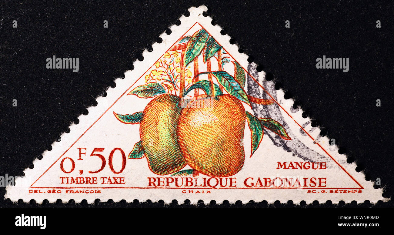 Mango fruits on postage stamp of Gabon Stock Photo