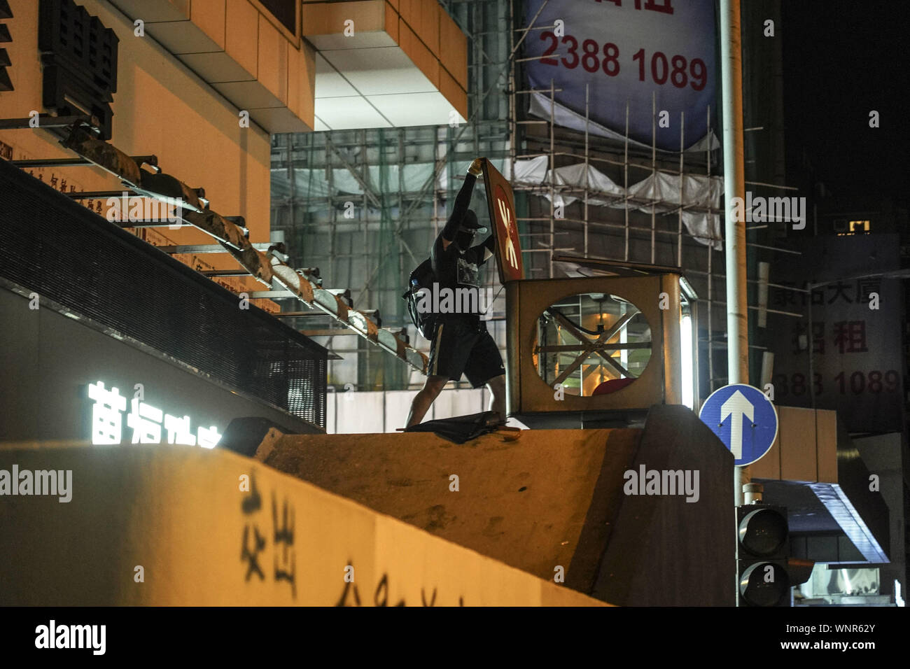 Kowloon, Hong Kong. 6th Sep, 2019. Protesters breaks subway sign at Yau Ma Tei Metro Station on Friday September 6, 2019 in Mong Kok Town Kowloon, Hong Kong.Thousands of protestors gathered outside of Mong Kok police station and around that area to protest the police violence against citizens of Hong Kong.Protesters Moved Nathan Rd to south, destroying surveillance cameras, street signs, building barricades with wooden panes and garbages then set on fire as they move on.9/6/2019.Kowloon, Hong Kong. Credit: ZUMA Press, Inc./Alamy Live News Stock Photo