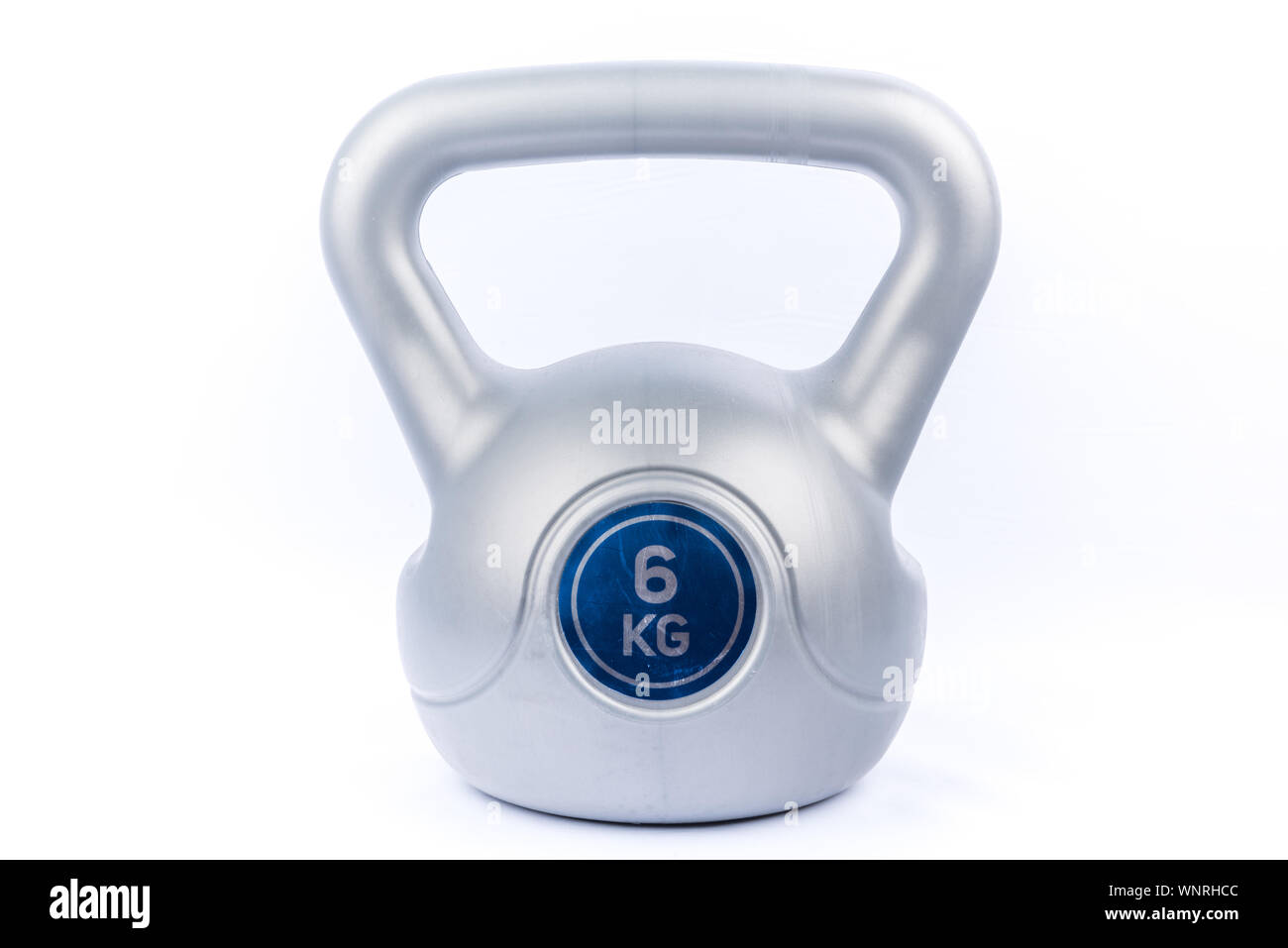 grey heavy kettle bell for bodybuilding and workout and training for good muscles on a white background Stock Photo