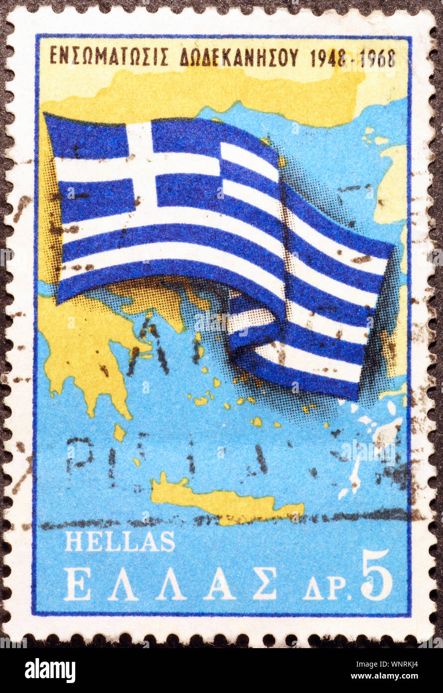Greek flag over map of Greece on postage stamp Stock Photo