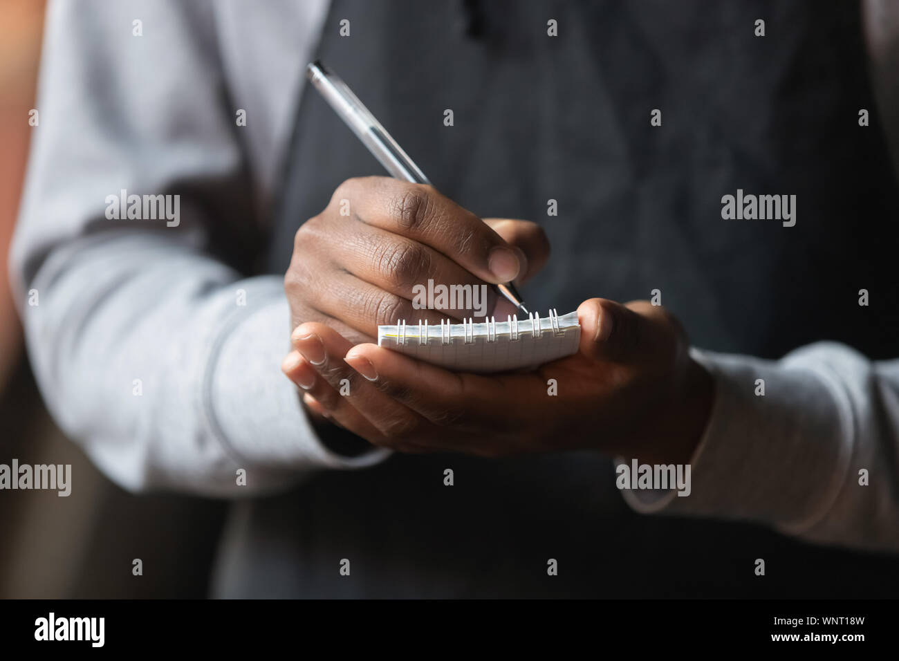 Black waiter uniform hi-res stock photography and images - Alamy