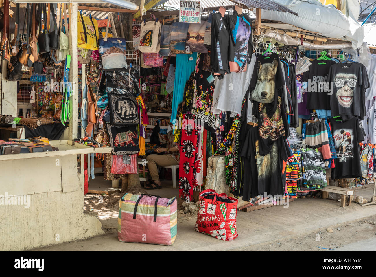 Balabag, Boracay Island, Philippines - March 4, 2019: Multicolor Visual overload created by souvenirs on display in and in front of Endeqal Souvenir s Stock Photo