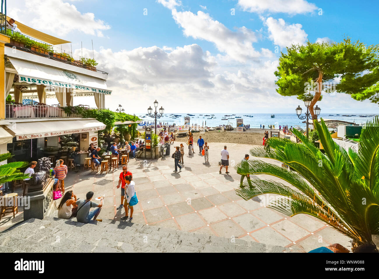 The sandy beach, cafes and shops at the coastal town of Positano Italy on the Amalfi Coast of the Mediterranean Sea Stock Photo