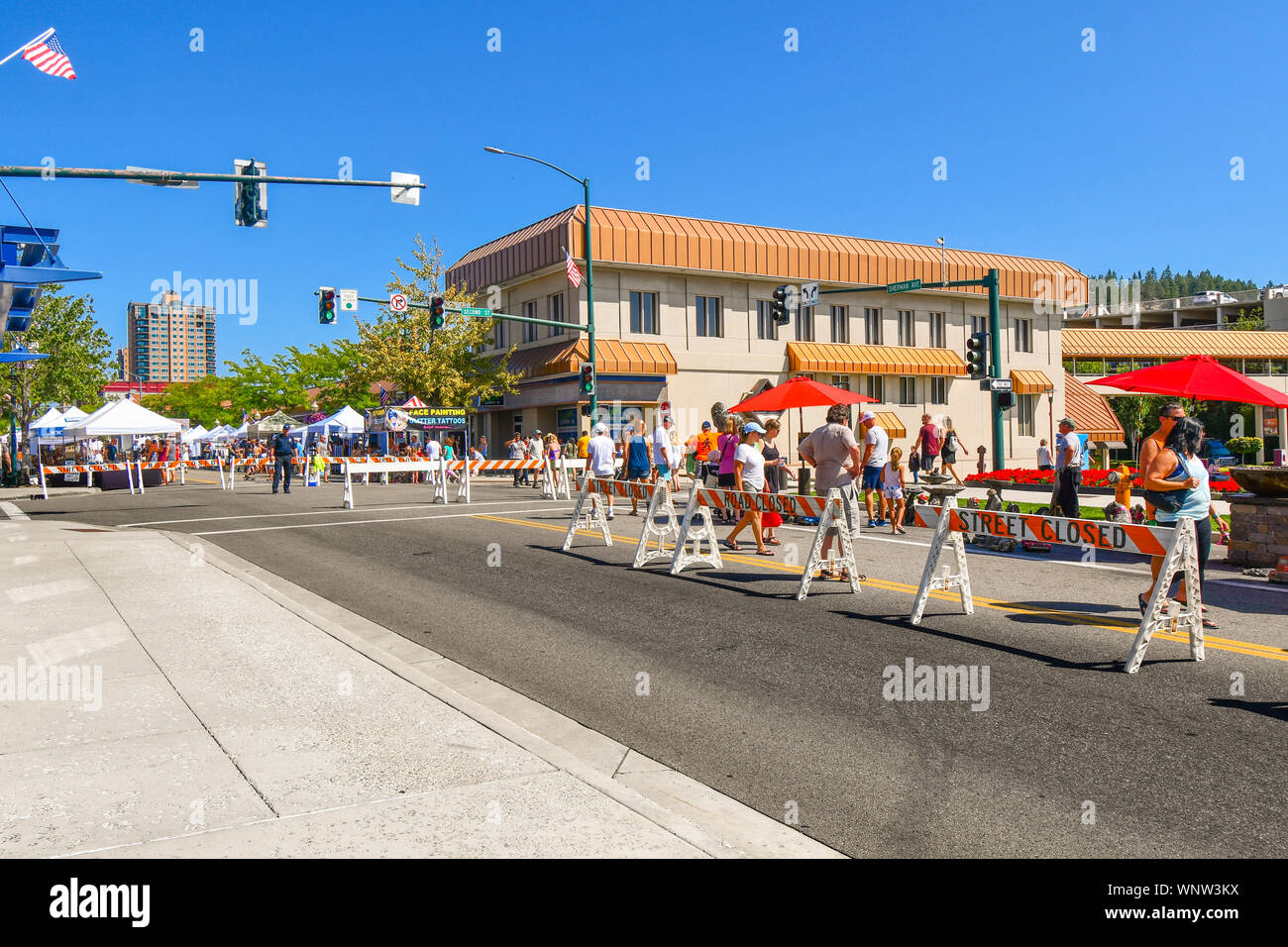 Tourists and local Idahoans enjoy the annual street and art fair in the Inland Northwest town of Coeur d'Alene, Idaho, USA Stock Photo