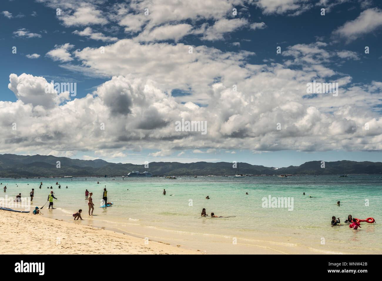 Balabag Boracay Island Philippines March 4 2019 White Beach Shows Sand And Azure Sea With Malay Island In Distance People In Water Cloudscape Stock Photo Alamy