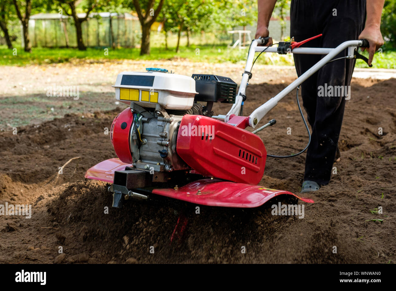 Garden tiller hi-res stock photography and images - Alamy