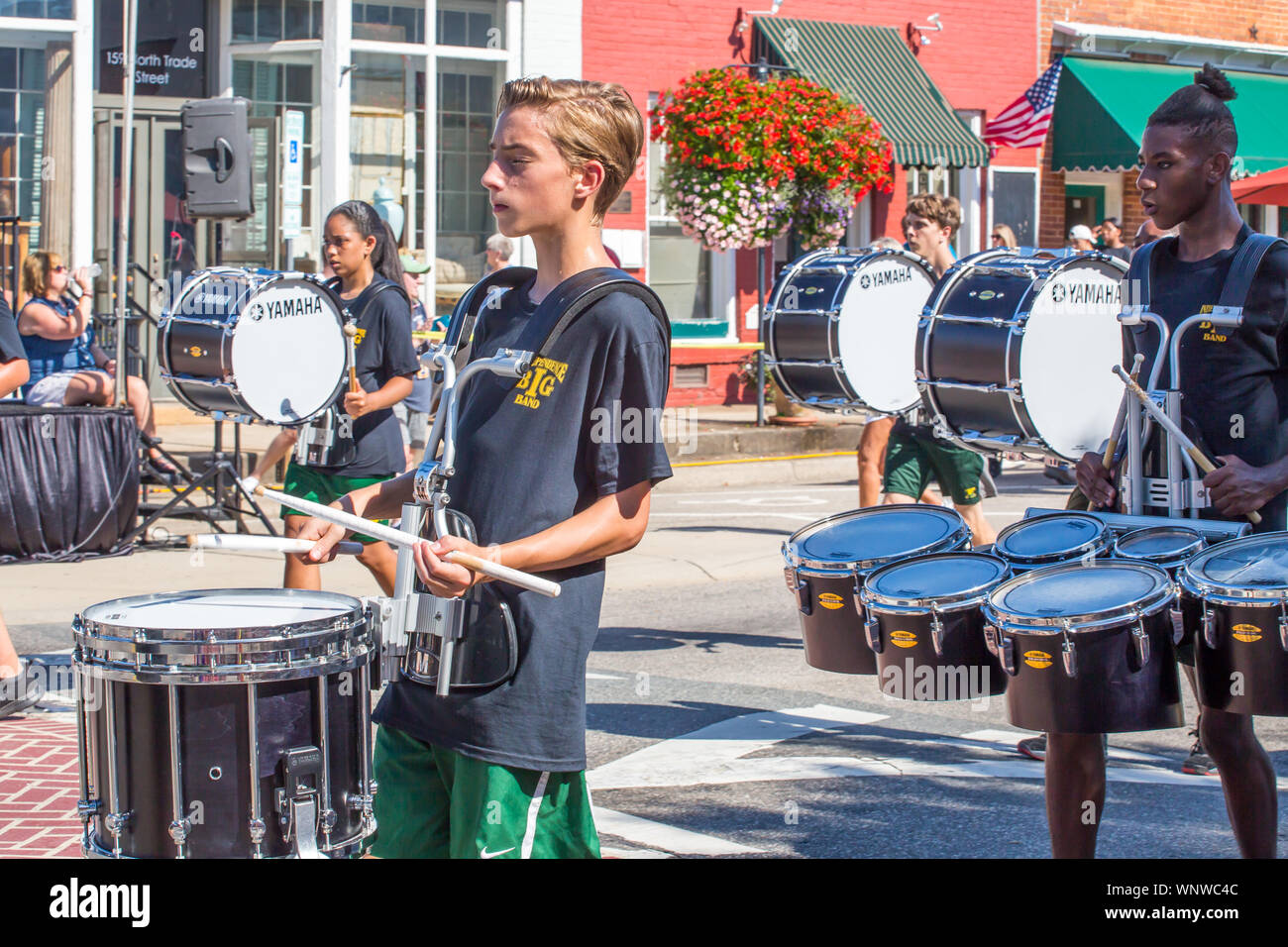 MATTHEWS, NC (USA) - August 31, 2019: A high school marching band performs at the Labor Day parade held during the annual "Matthews Alive" event. Stock Photo