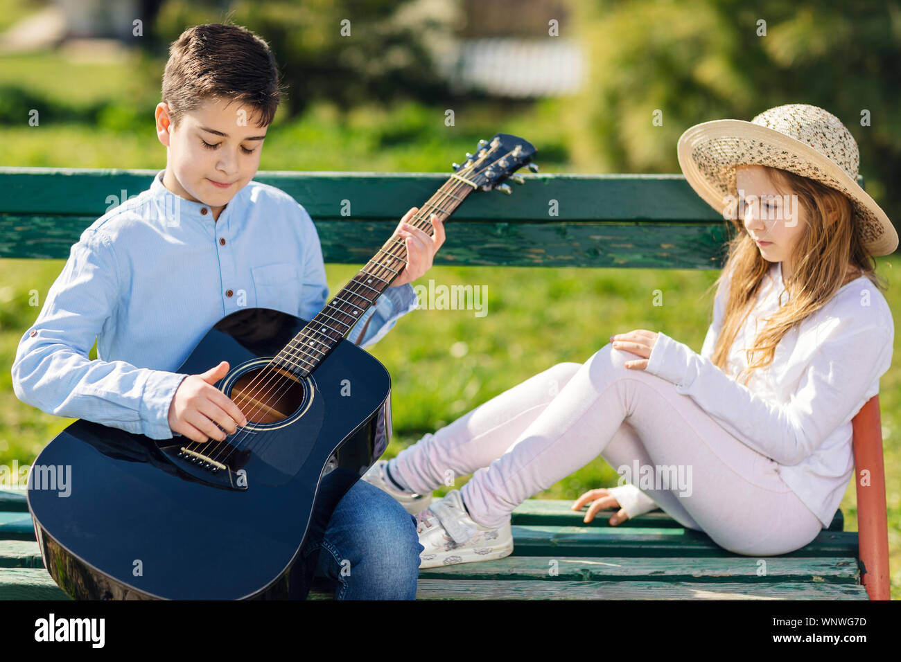 Boy romantic guitar play hi-res stock photography and images - Alamy