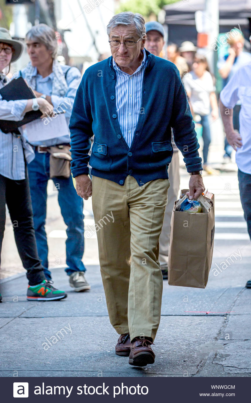 light blue shirt brown pants