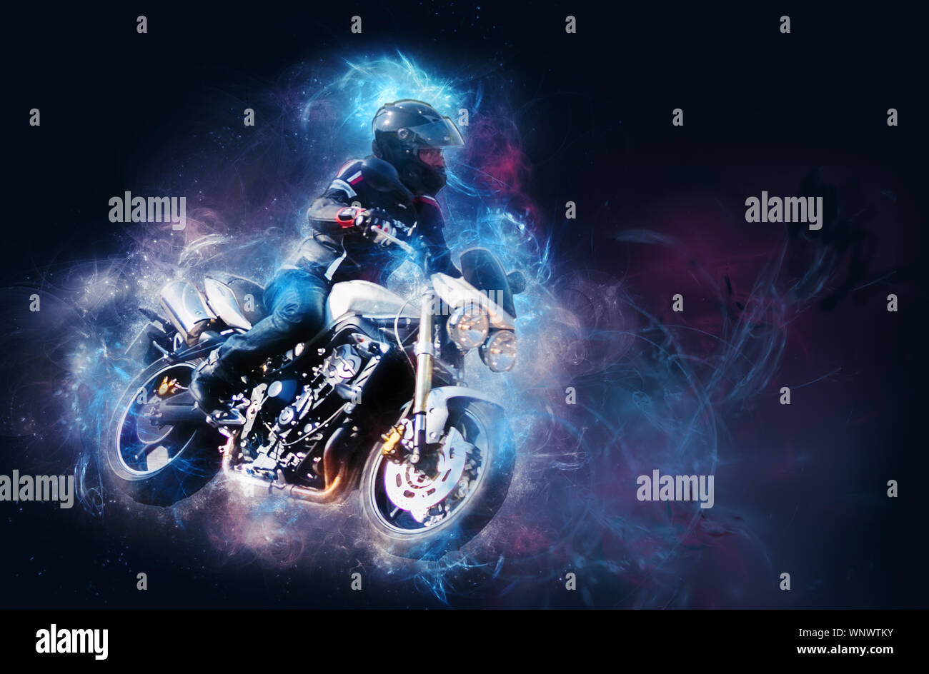 biker on his motorcycle with cosmic effect. Stock Photo
